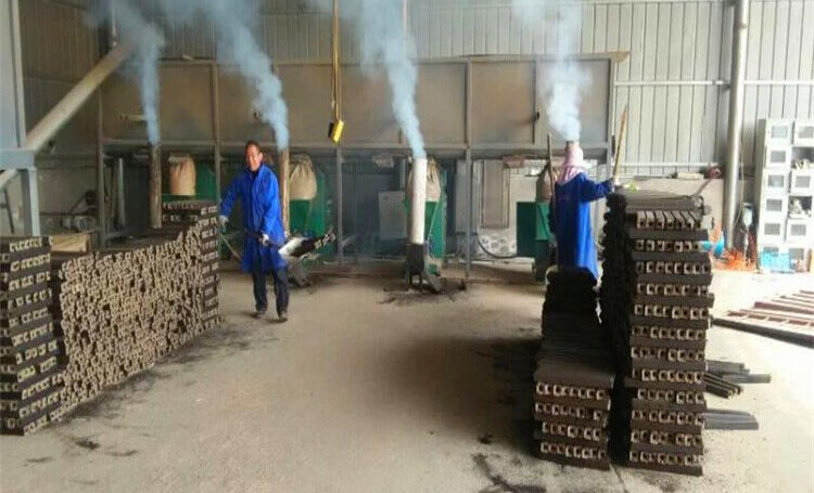 sawdust enters a screw briquette press